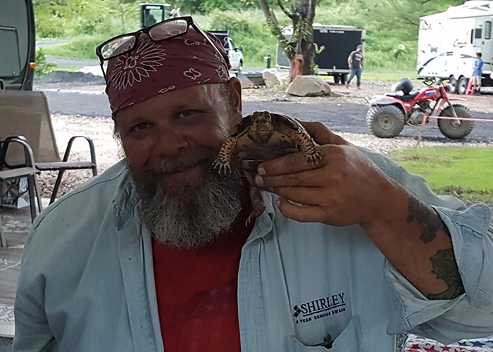 Man and his turtle.